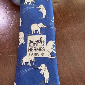 Hermes tie with playful elephants.